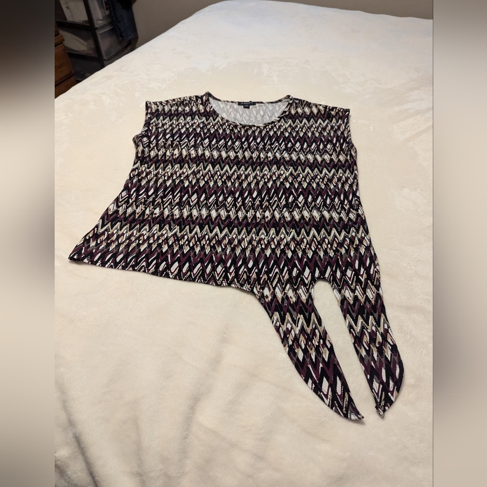 Jessica sleeveless pull over blouse with a tie at waist. Size XL (18) . Sears.